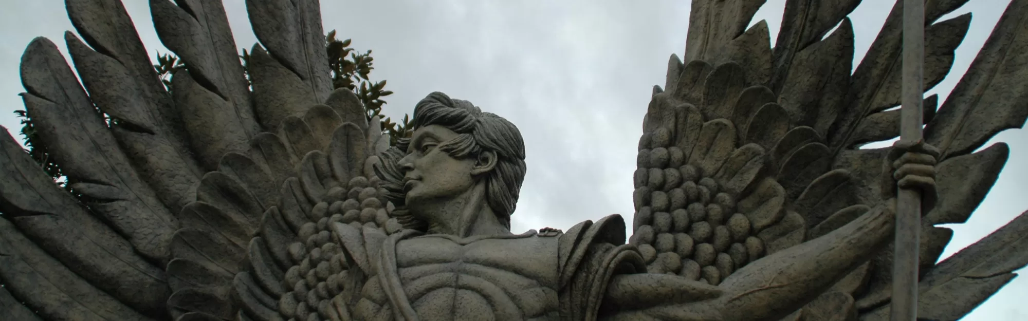 cropped image of 12 ft bronze statue of arch angel st. micheal by Studio 23