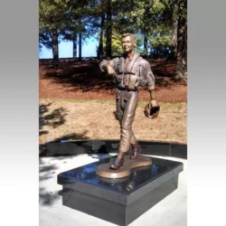 life size bronze statue of a soldier walking