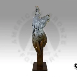 Bronze sculpture of womans body with multitoned patina, scalloped edges and seashells