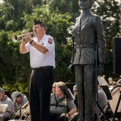 blue jacket woman bronze statue larger than life size