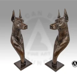 2 bronze busts of doberman dogs