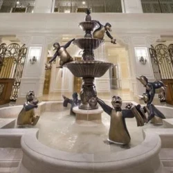 Bronze penguin state at the Ritz hotel