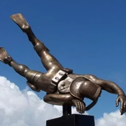bronze life size statue of a navy scuba diver
