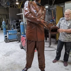 bronze life size sculpture of man