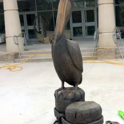 fine are public bronze animal sculpture of pelilcan