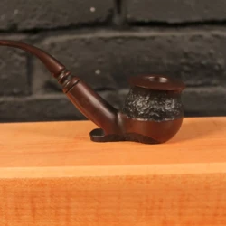 small bronze sculpture of a pipe