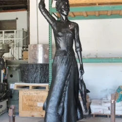 bronze statue of a life size woman
