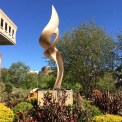 Bronze abstract sculpture at college at UCF in called Flame