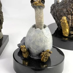 fine art bronze sculpture of a baby ostrich in shell, papa by arthur wilson
