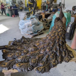 bronze statue of a peacock