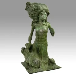 bronze sculpture of a merrmaid patina'd green